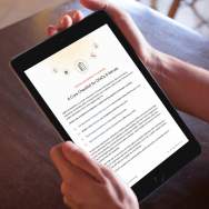 The digital accessibility playbook opened on an iPad.