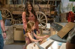 Child and her mother checking out western exhibit at Panhandle-Plains Museum
