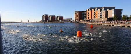 Image of people swimming on a very sunny day