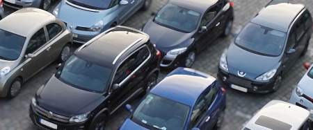 photos of cars in a car park
