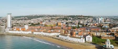 Arial view of Swansea city from the sea