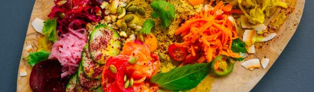 Overhead view of different foods on cutting board