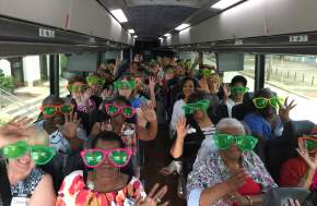 Attendees on Beaumont tour bus