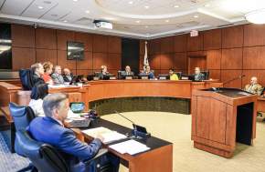 Members of the City Hall Council seated during a meeting