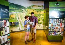 Hikers looking at a map in the Frederick Visitor Center