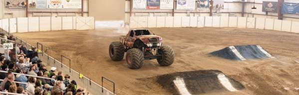monster truck about to jump a ramp