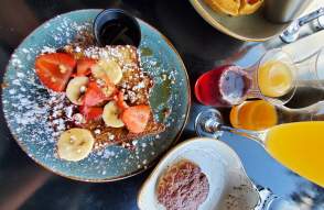 Breakfast of French toast and mimosas