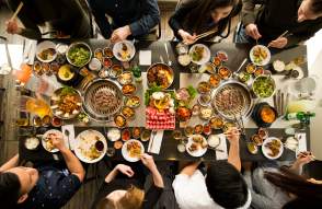 Above photo of group dining at korean BBQ