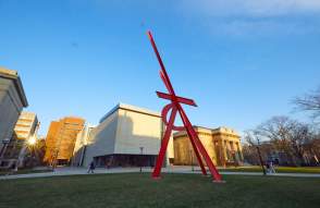 Large red sculpture outside of UMMA