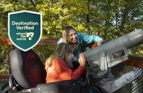 Mother and Daughter looking through telescope, with WTW verified badfe