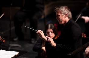Conductor & Orchestra performing
