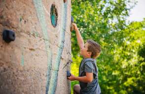 Boy on a climbing wall