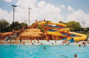 people enjoying water park and slides