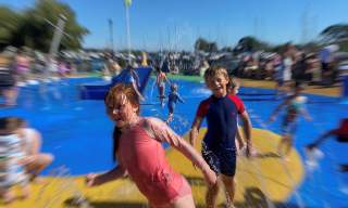 Children playing in water at Quomps Splash Park