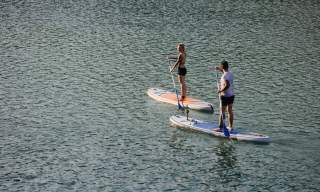 river activities paddle boarding