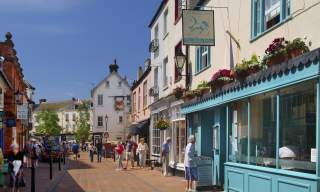 sidmouth high street with some people walking about