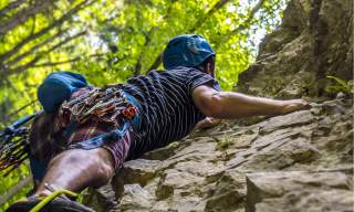 man rock climbing
