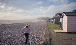 running along budleigh beach