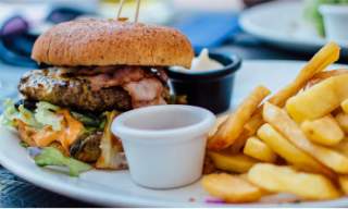 A burger and chips on a plate