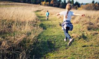 children running in field