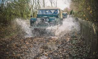 a land rover driving the tracks at Goodwood