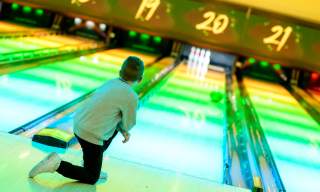 Boy bowling at Tenpin Chichester