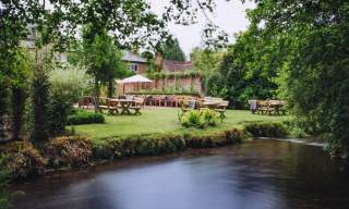 The Drummond at Albury - exterior by the river Tillingbourne