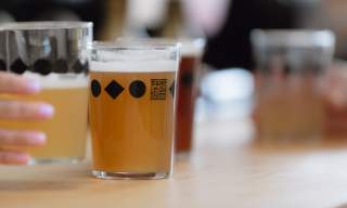 Two pints of craft beer on the bar at Three Legs Brewery, Sussex