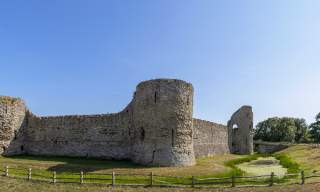 A wide shot of Pevensey castle in the sunshine