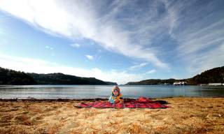 Child on beach at Rosfjord Lyngdal