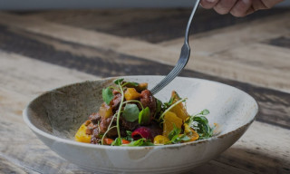 A white plate with healthy food.