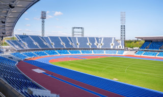 The inside of the Alexander Stadium in Perry Barr, with visible running track and spectator stands