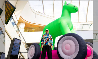 Bruce Asbestos in front on his inflatable sculpture 'Faster Horse'