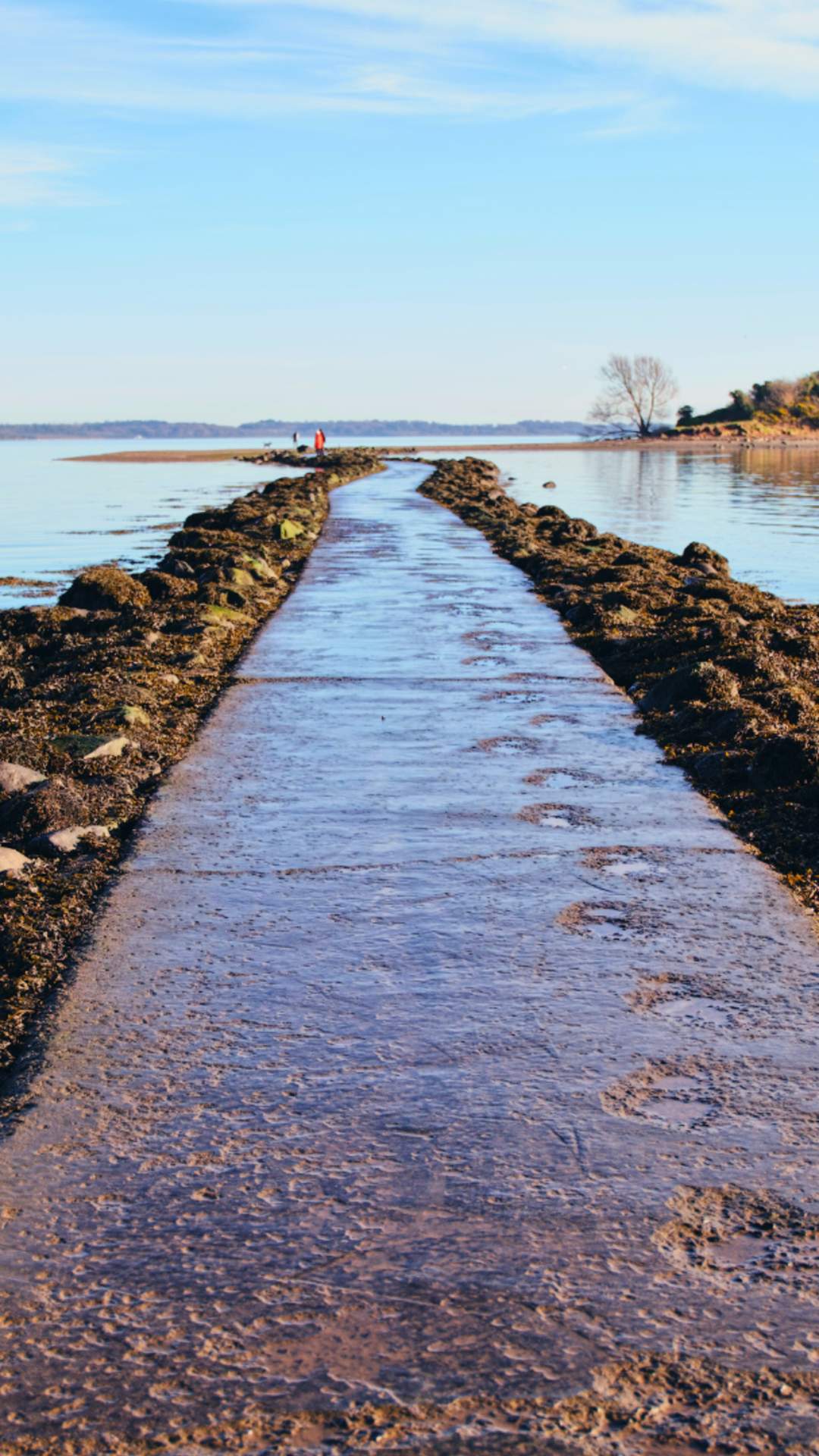 The curved path to Island Hill, which becomes submerged during high tide