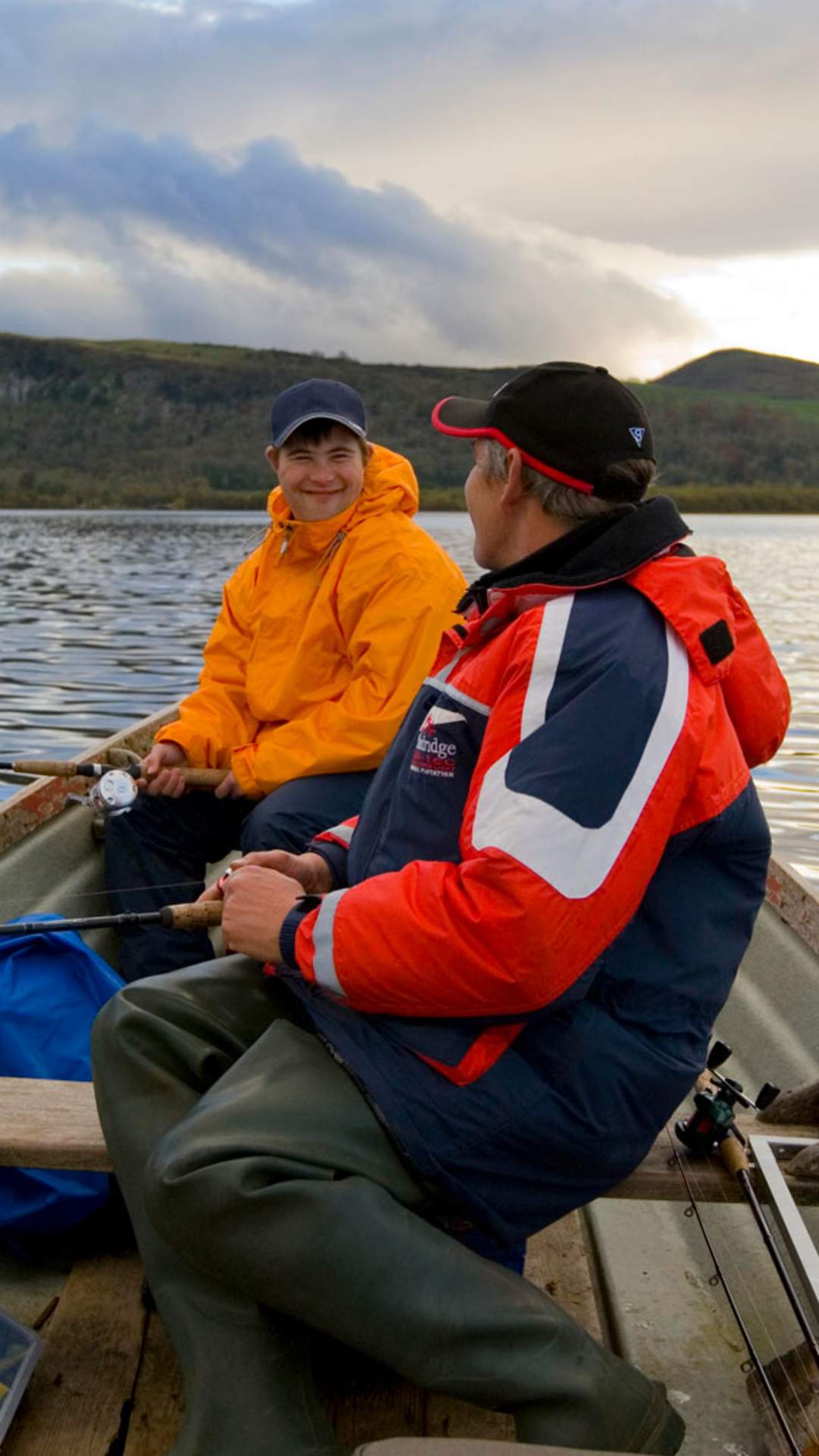 Father and son fishing on a row boat on Lough Macnean in Fermanagh