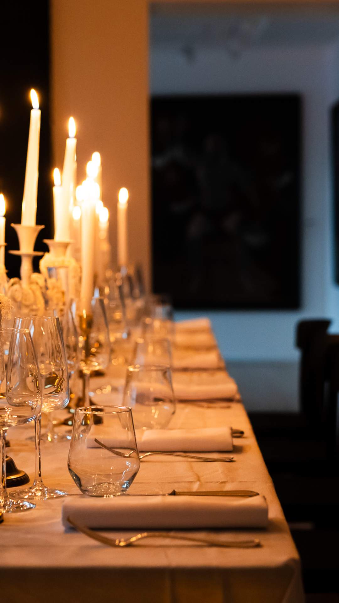 Candlelit table set for a supper club evening in Northern Ireland.