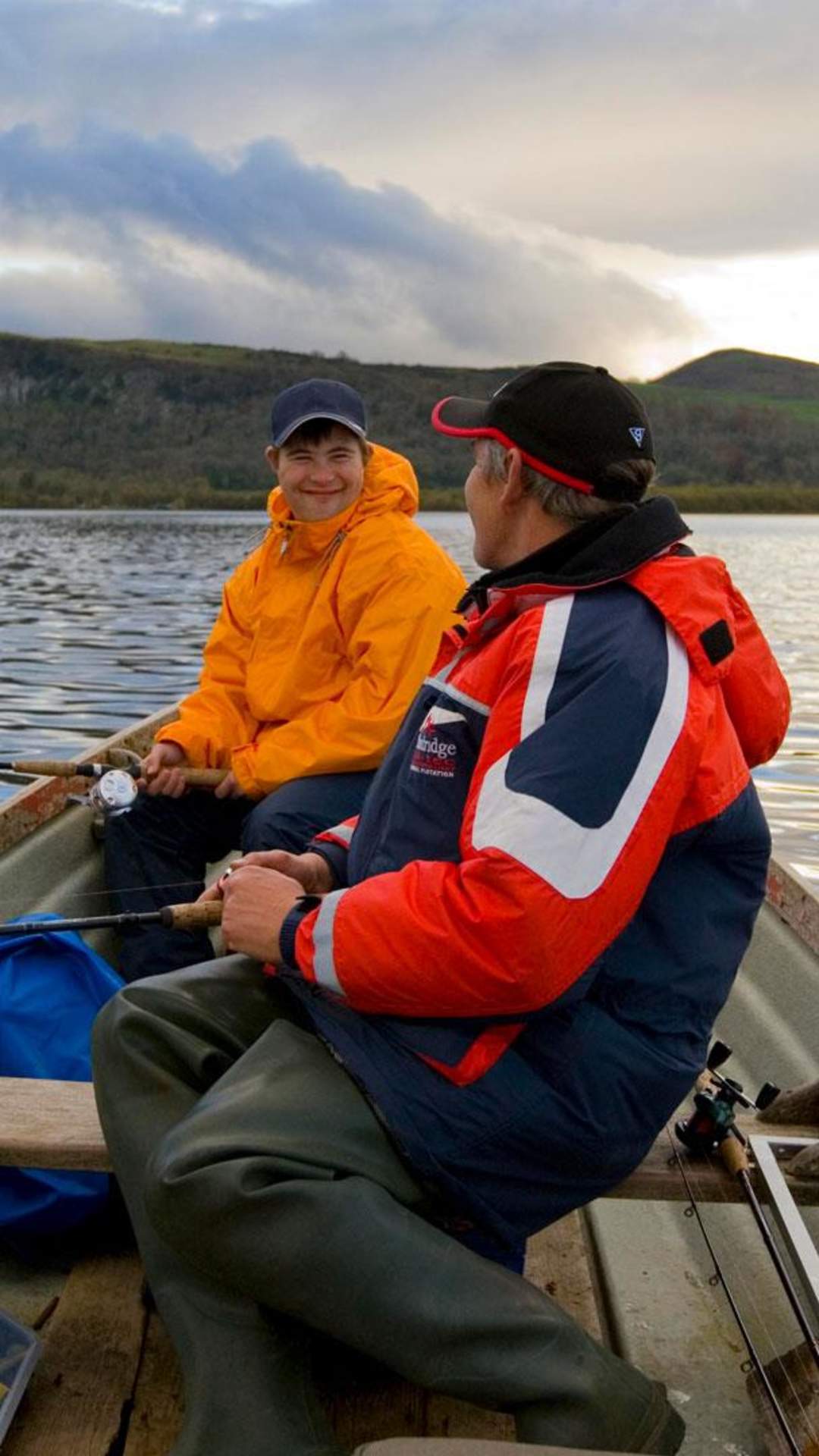 Father and son fishing on a row boat on Lough Macnean in Fermanagh