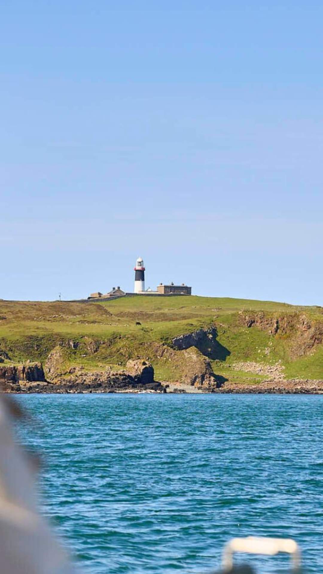 woman looking out over water