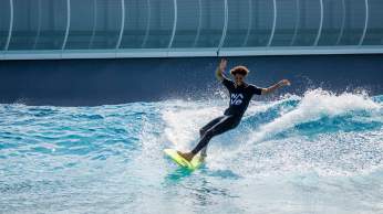 Person surfing at The Wave - credit The Wave
