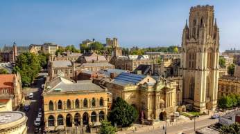 An aerial view of the Wills Memorial Building and Bristol Museum at the top of Park Street in central Bristol