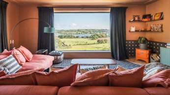 A view over countryside from a bedroom at Yeo Valley