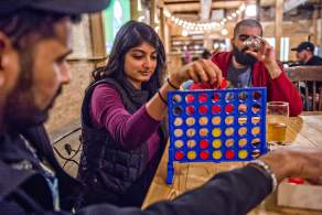 Slow Pour Brewing group playing games
