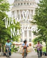 The cover of "With Love, Madison" featuring three people biking in front of the Capitol. Two of the people are holding hands while biking.