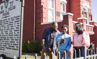 African American family at the James A Fields House