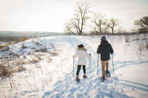 couple skiing on the slopes in Galena Country during the winter