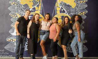 Group in front of Wings Mural