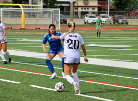 female soccer player with ball