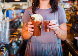 bartender holding bloody mary