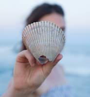 Girl Holding Shell