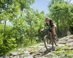 Woman mountain biking in Knoxville